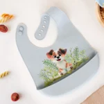 Babete silicone cãozinho azul